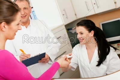 Woman at reception of clinic