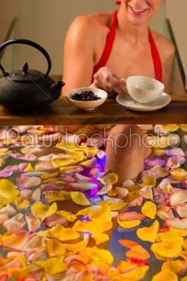 Woman bathing in spa with color therapy