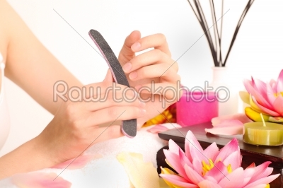Woman doing manicure