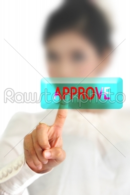 woman hand pressing approve button on a touch screen