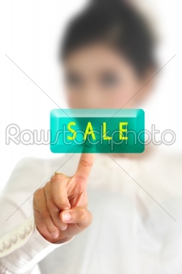 woman hand pressing sale button on a touch screen
