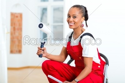 Woman in her home renovating diy