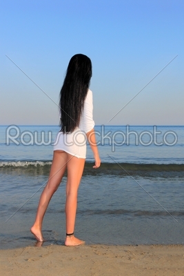 woman posing on the beach