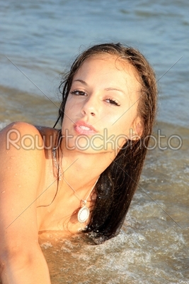 woman posing on the beach