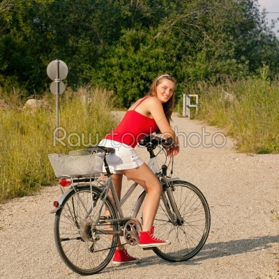 Woman riding her bicycle in summer