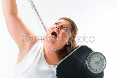 Woman strangling herself with measuring tape
