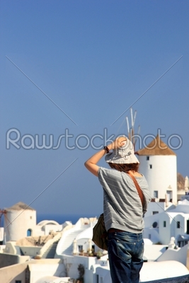Woman visiting the island of Santorini