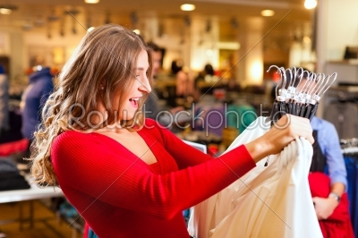 Women in a shopping mall with clothes