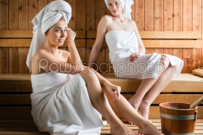 women in wellness spa enjoying sauna infusion