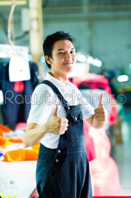 Worker in a chinese garment factory