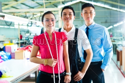 Worker, manager and designer in Chinese factory