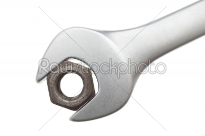 Wrench with a nut
