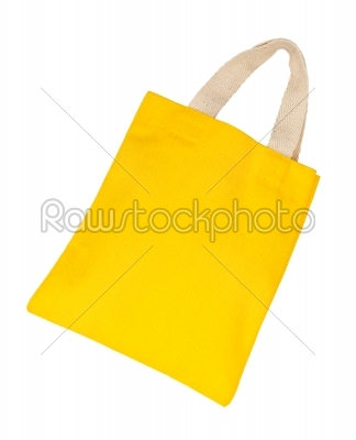 Yellow cotton bag on white isolated background. 