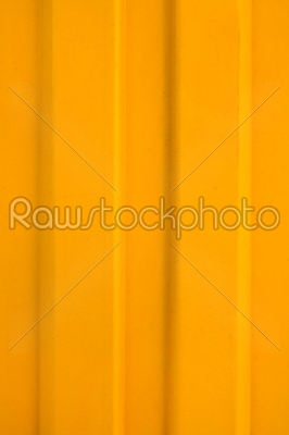 Yellow metal background closeup