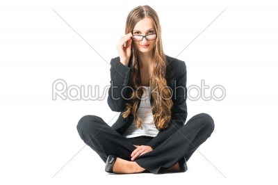Young business woman with glasses scrutinizing