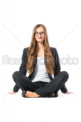 Young business woman with glasses sitting on floor