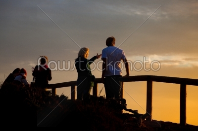Young couple watching the sunset