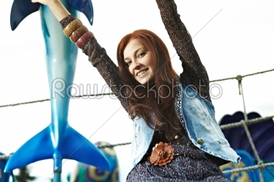 young girl at an amusement park