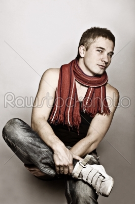 Young man in fashionable clothes