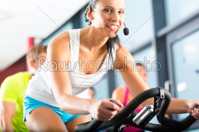 Young People Spinning in the fitness gym