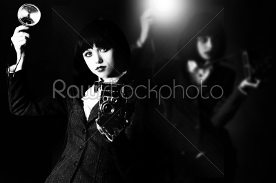 young woman and retro camera
