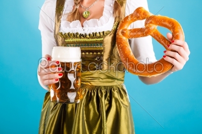 Young woman in traditional clothes - dirndl or tracht