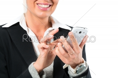 Young woman using her mobile phone for texting