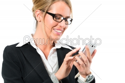 Young woman using her mobile phone for texting