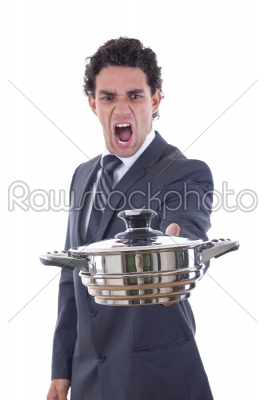 adult man looking at pot for cooking with expression