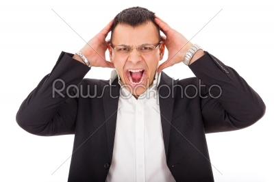 angry businessman holding head