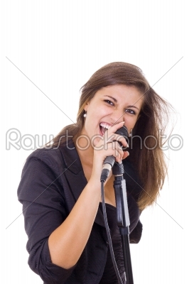 attractive woman screaming on microphone singing
