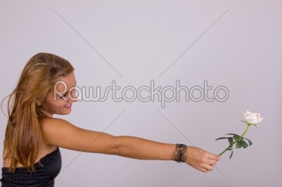 attractive young woman with white rose