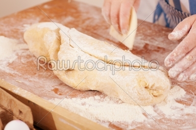 Baking biscuits - Woman kneads dough