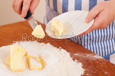 Baking biscuits - Woman mixes dough