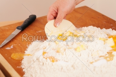 Baking biscuits - Woman mixes dough