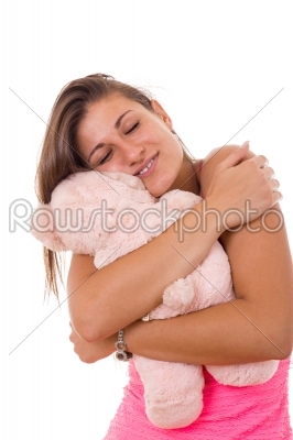 beautiful girl hugging teddy bear
