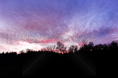 Beautiful sunset / sunrise with blood red clouds in blue sky