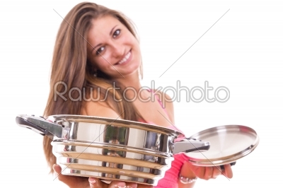 beautiful young woman housewife with a kitchen saucepan pot