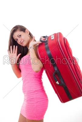 beautiful young woman with travel suitcase saying goodbuy