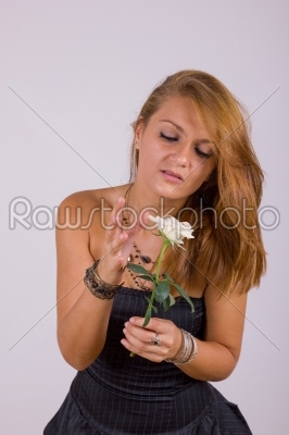 beautiful young woman with white rose