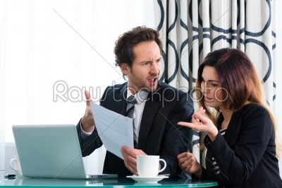 Boss and assistant or in hotel working together