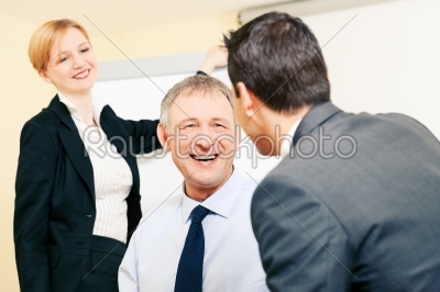 Business team discussing pleasant things