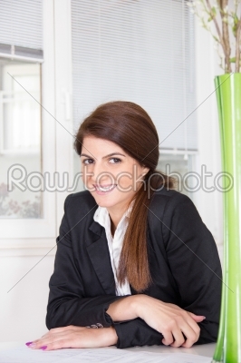 business woman smiling at home
