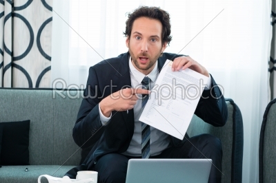 businessman in hotel working with agreement