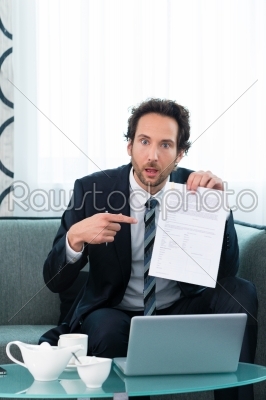 businessman in hotel working with agreement