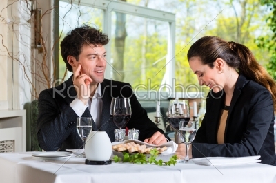 Businesspeople having lunch in restaurant