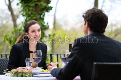 Businesspeople having lunch in restaurant