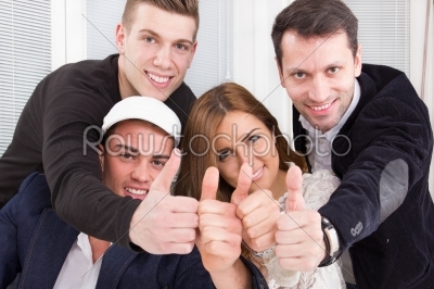 casual group of successful people make the ok thumbs up sign
