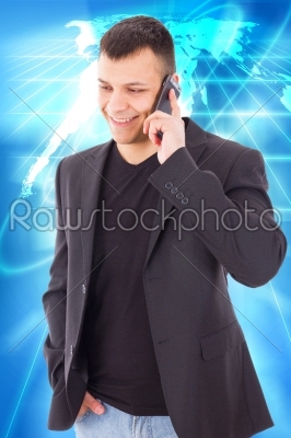 casual man in a suit talking over mobile and smiling