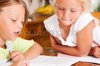Children doing homework for school